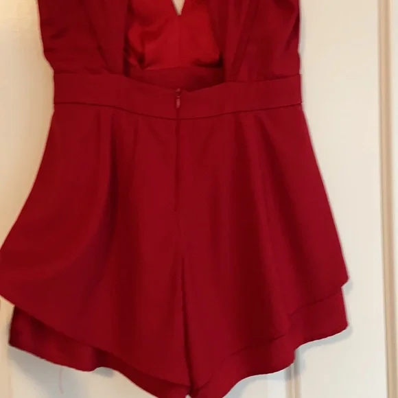 Red jumpsuit Romper. Pleated front. Open back. Size medium. Brand A’gaci - Picture 3 of 5